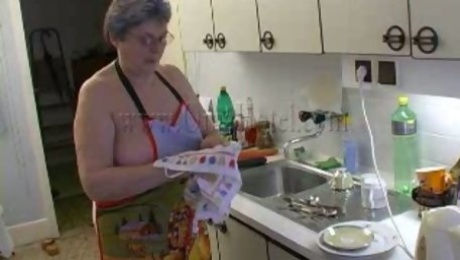 Fat woman with big boobs fucks her pussy with her sex toy