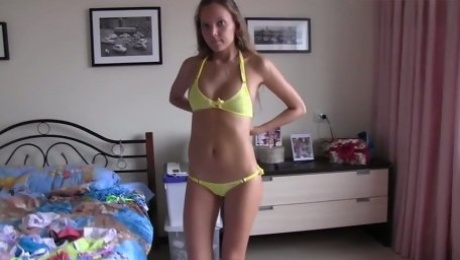 Sexy amateur babe changes swimsuits showing off her fresh and hot body