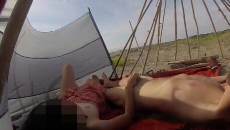 Flashing my cock in front of a boys in public nudist beach while my wife masturbates me Part 2
