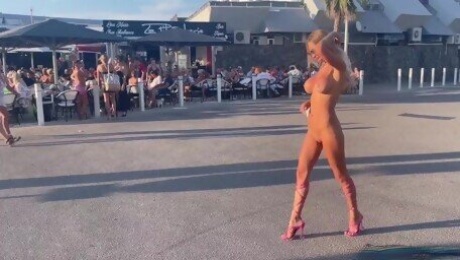 Monika Fox Walks The Streets Of Cap d'Agde Naked
