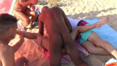 Gangwith fucking on the beach. Blonde and 4 guys.