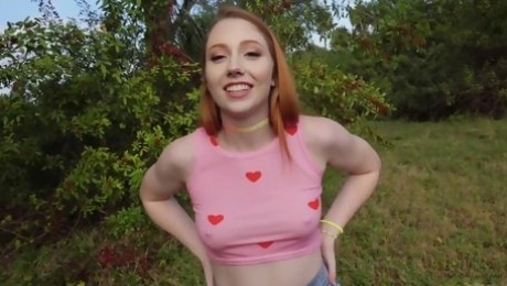 Smiley redhead teen Arietta Adams gets fucked outdoors